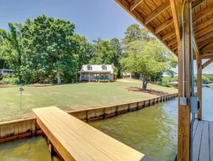 Image of PRIVATE BEACH! Amazing rustic cabin with 450' of water frontage on Jackson Lake