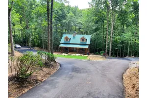 Image of Luxurious Log Cabin on Babbling Creek Near Lake