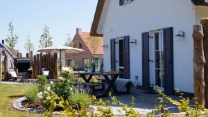 Image of New thatched house with lake view - modern and charming - 3 bedrooms & sauna