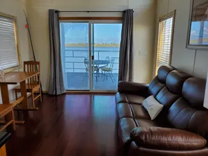 Image of Rebel's Rest - A Romantic Getaway houseboat  moored on the Apalachicola R