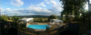 Image of STONE HOUSE WITH MAGNIFICENT OPEN VIEWS AND COVERED POOL