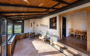 Image of House in the forest with fenced garden