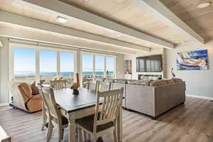 Image of Gorgeous waterfront home with a private hot tub, gas fireplace, & beach access