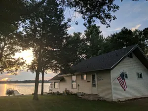 Image of Hamptons style Lake house on Sunset point. With water on both the east and west!