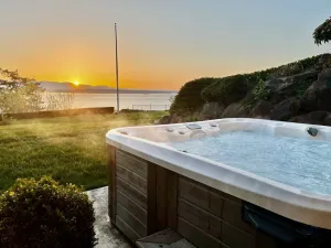 Image of Luxury Water View 6BR Retreat with Hot Tub and Gym
