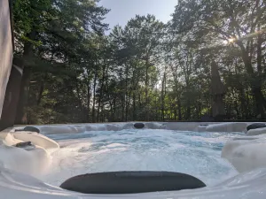 Image of Wooded Retreat: 3 Bed\/3 Bath, Hot Tub, A\/C,  Fire Pit, Ping Pong + Yard Games