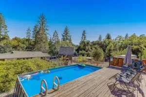 Image of Spacious home with indoor & outdoor kitchens, a private pool, and free WiFi