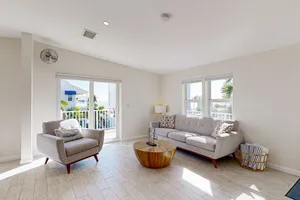 Image of Modern waterfront home with balcony, patio, grill, W\/D, & easy Atlantic access