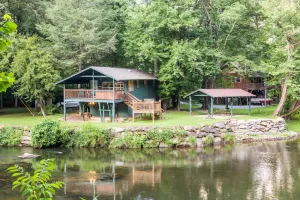 Image of Cottage on the Tuckasegee River with firepit, picnic area, hot tub, & AC