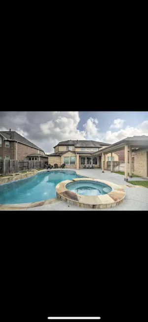 Image of \"Luxurious 3-Bedroom Mansion with Heavenly Heated Pool and Jacuzzi Retreat\"
