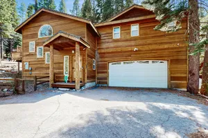 Image of Wooded Charm with Jetted Tub, Deck, & Full Kitchen - Close to Town
