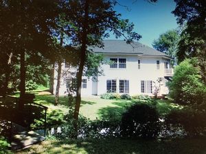 Image of Log Inn on Madison Lake.   Multi generation. Corporate retreat for team building