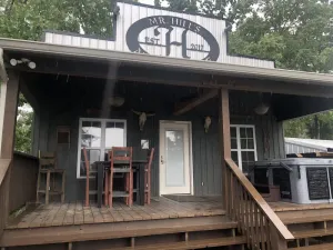 Image of Mr. Hill's Mercantile Cabin with a hot tub
