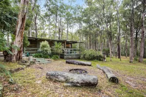 Image of Nestled in a peaceful bush setting lies this tranquil log cabin getaway