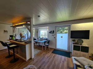Image of Garden view holiday flat 50sqm with terrace, garden, fireplace and open kitchen with bar