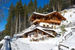 Image of detached holiday house located forest edge, elevated above Großarl-Valley