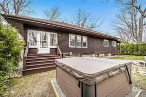 Image of Renovated historic bungalow with private hot tub, sunroom, firepit & central AC