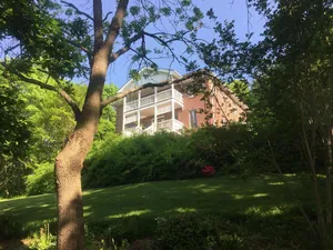 Image of Top of the Hill is located on a quiet street with off street parking available.