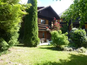 Image of old ,small ,typical chalet in the center of a mountain village :Le Grand Bornand