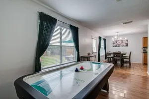 Image of FUN Family: 4BR, King Bed, Games, 2 SmartTVs