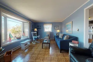 Image of Bright & nautical beach home with enclosed yard & outdoor shower - walk to beach