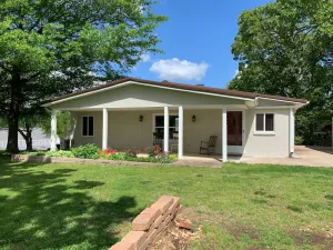 Image of BobCat Cottage lake front home on Grand Lake, OK with dock