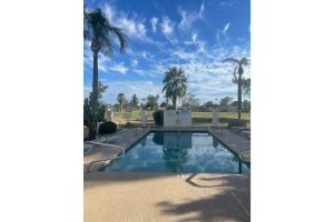 Image of 2-bedroom vacation home with pool on golf course