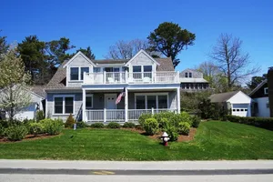 Image of Blue water views and coral sunsets from every room in this beautifully appointed home.