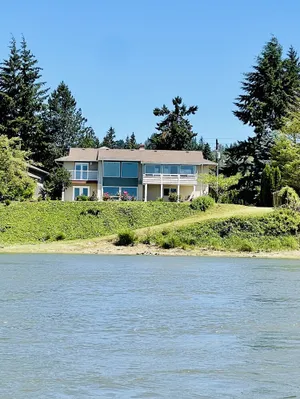 Image of River House Retreat. Beautiful views from this waterfront property with Hot tub!