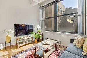 Image of Bright 2BR Apartment w Free Parking, Wifi, Gym, Central Location