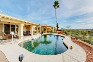 Image of Mountain-view home with pool, furnished patio, washer\/dryer & central AC