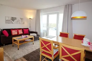 Image of Pretty vacation apartment by the sea with balcony and view of the green North Sea dike - Hus Inselkieker