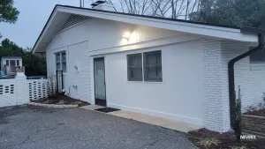 Image of Renovated Suite with 1 queen bed and a Twin. Kitchen & bath for your privacy.