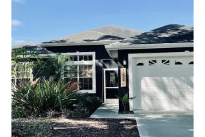 Image of Cheerful 4 Bed, 3 Bath Home with Screened Pool