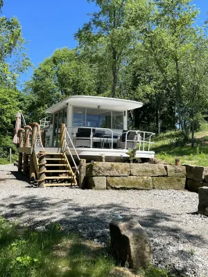 Image of Beached houseboat with lots of character and deck jacuzzi