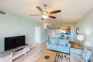Image of Well-equipped & located seventh-floor condo w\/balcony, shared gym, pool, & more