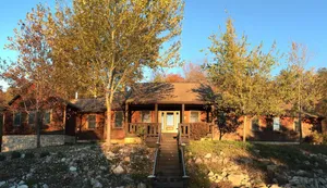 Image of The Lodge at Harvest Moon sleeps 16 with five bedrooms and unique private Pub