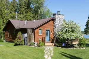 Image of Log Cabin on the Canal of the Indian River between Burt Lake and Mullet Lake!