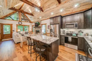 Image of New Build Luxury Cabin near Town! Fire Pit~ Hot tub~ Game Room~Pool & Fireplace!