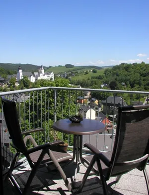 Image of modern holiday apartment with dreamlike view of the historical old town