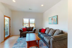 Image of Stylish condo w\/ balcony, private washer\/dryer, & full kitchen - close to river