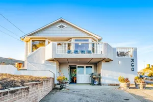 Image of Large home with game room & furnished deck with ocean & pier Views