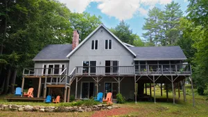 Image of Waterfront Home with ample outdoor entertainment space on Thompson Lake