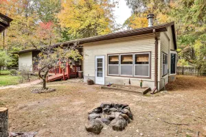 Image of Lakefront home with private dock, screened porch, woodstove, fast WiFi, & W\/D