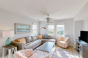 Image of Dog-friendly ocean view townhouse w\/ central AC, private W\/D, & pool access