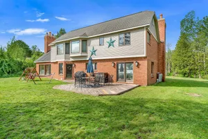 Image of Family-Friendly Lake View Home with Patio, Grill, Deck, Fireplace, & Free WiFi