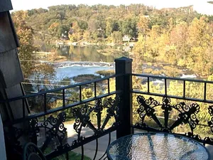 Image of The charming French Chateau overlooks the beautiful falls of the Spring River