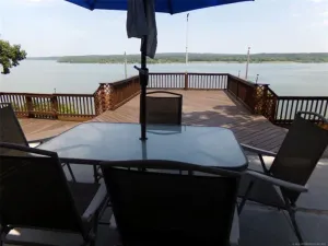 Image of Spectacular lake view with a huge deck and a Hot Tub.