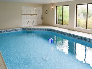 Image of A dog friendly cottage for four with its own swimming pool and enclosed garden.