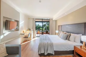 Image of Two Adjacent King Suites with a Breezy Balcony